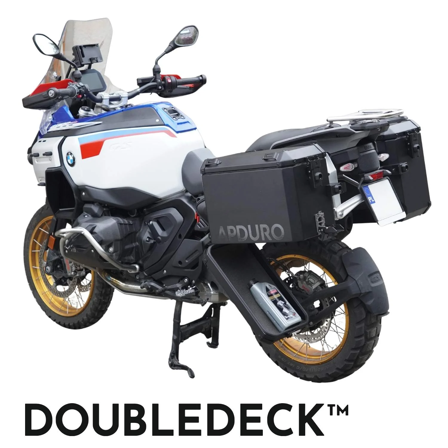 BMW GS Adventure con maletas Apduro DoubleDeck y el compartimento inferior izquierdo abierto.